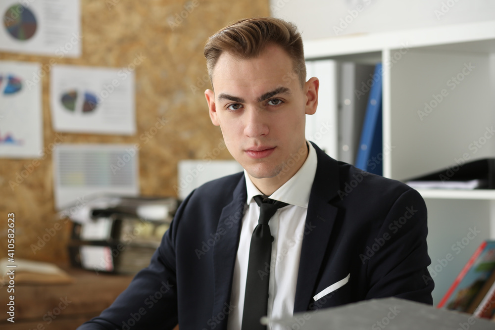 Handsome businessman portrait at workplace look in camera hands crossed. White collar worker at workspace, exchange market, job offer, certified public accountant, internal Revenue officer concept Handsome businessman portrait at workplace look in camera hands crossed. White collar worker at workspace, exchange market, job offer, certified public accountant, internal Revenue officer concept