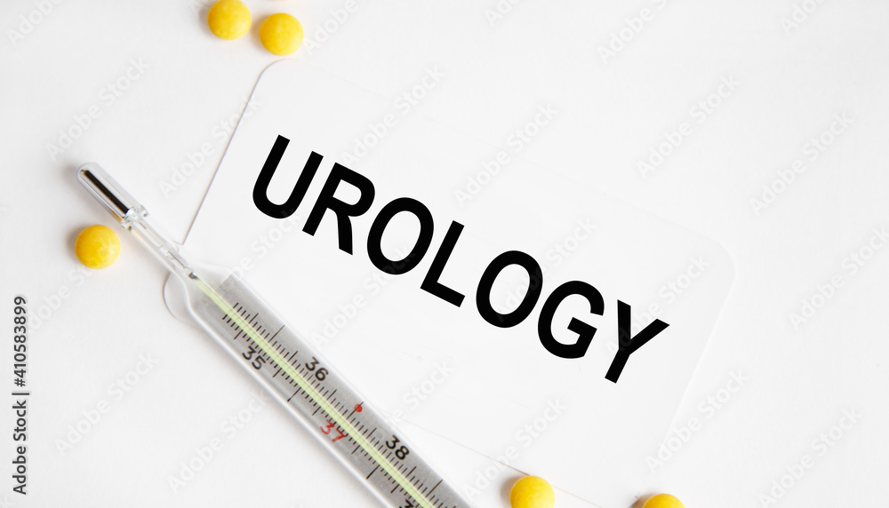 Obraz premium On the card the text urOLOGY, next to the thermometer and yellow tablets.