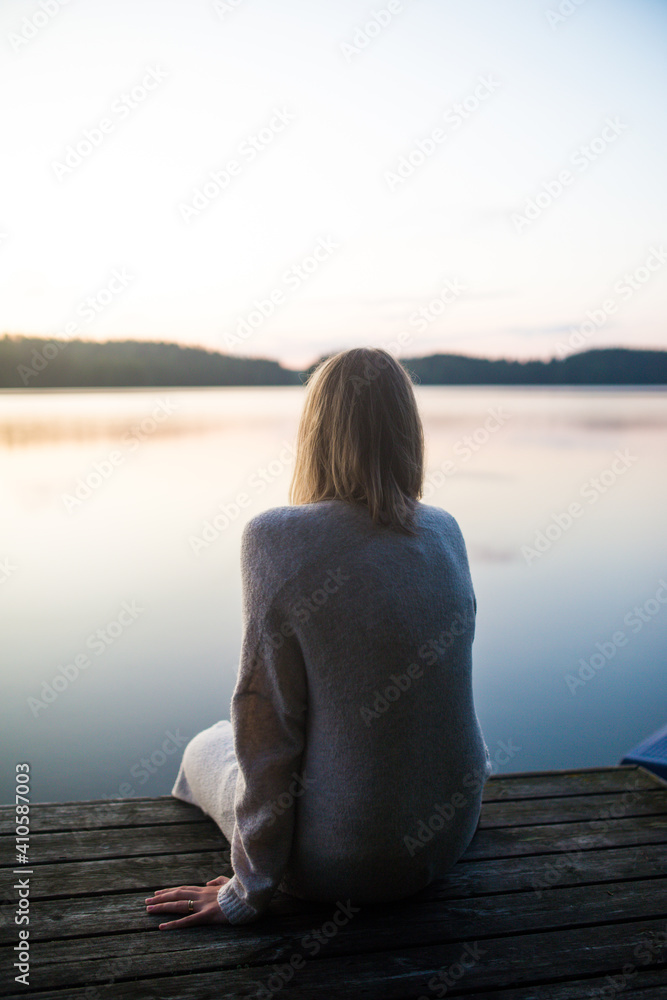 Woman at a lake