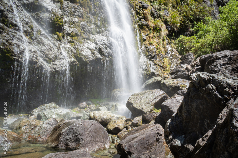 Thundering Earland Falls along the Routeburn Track, Fiordland, New Zealand. Thundering Earland Falls along the Routeburn Track, Fiordland, New Zealand.