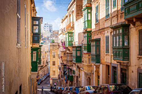 typical maltese street in valletta, malta, with balconies