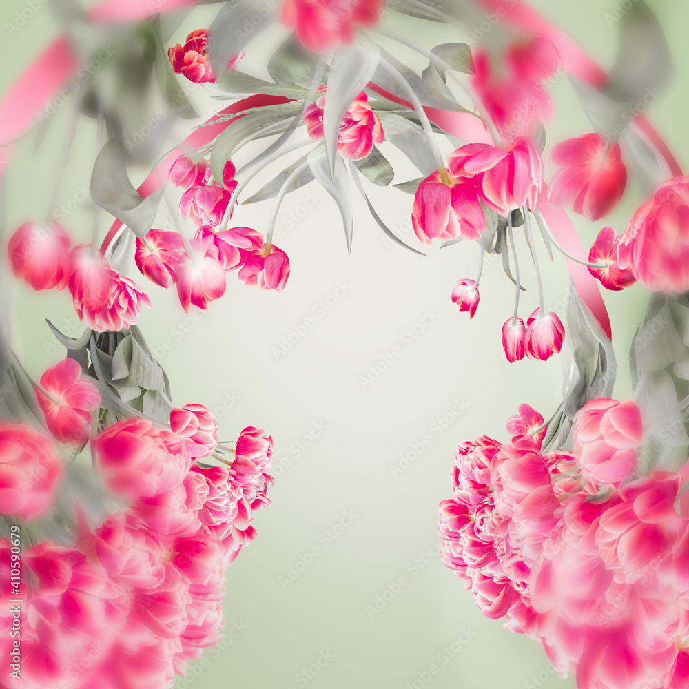 Beautiful tulips frame with copy space for your design. Pink tulips flowers at light green. Springtime background Beautiful tulips frame with copy space for your design. Pink tulips flowers at light green. Springtime background