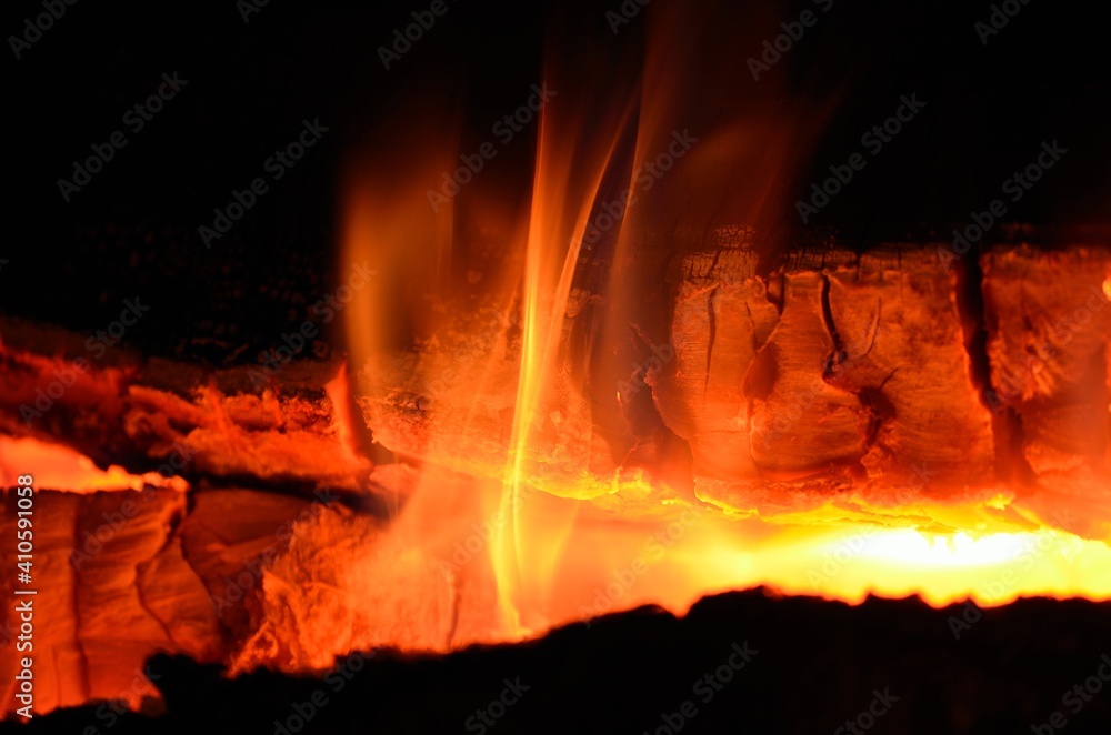 burning fire in fireplace on a cold winters day