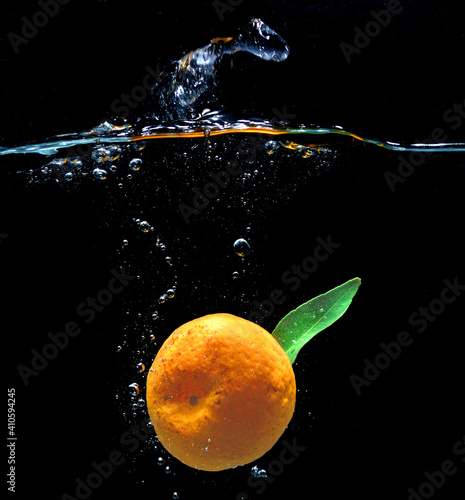 orange in water splash