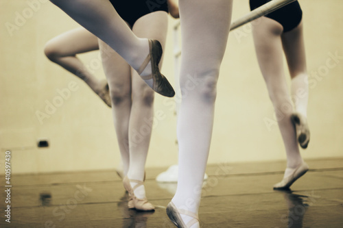 legs of ballet dancers in training