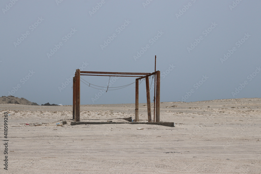 Masirah Island in Oman, beach structure made of wood for fishermen and visitors Masirah Island in Oman, beach structure made of wood for fishermen and visitors