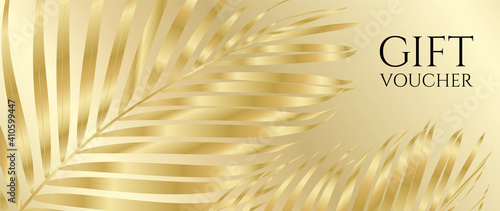Gift Voucher/ Gift certificate with gold luxe palm branch isolated on golden background. Premium template useful for vip invitation, golden coupon design