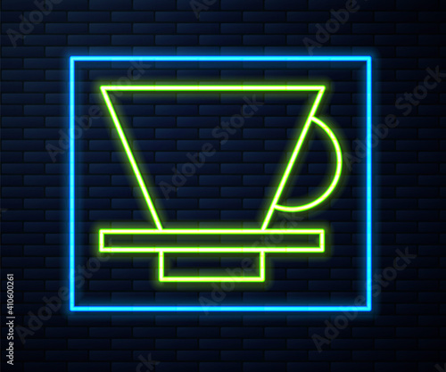 Glowing neon line V60 coffee maker icon isolated on brick wall background. Vector Illustration.