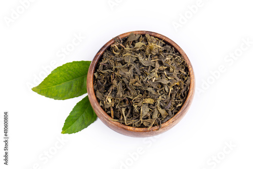 Dried green tea on the whit...