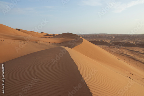 Sands of the desert at wahiba  arabic landscape  sand dunes and forms at sunset