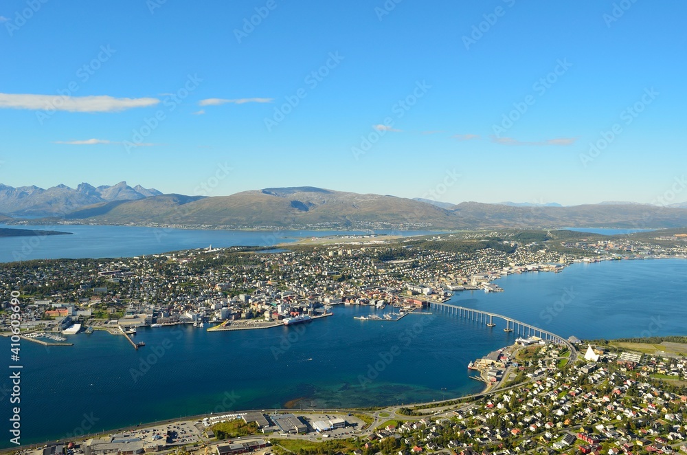 overview photo of the arctic circle city of Tromsoe in northern Norway in summer., mountain view