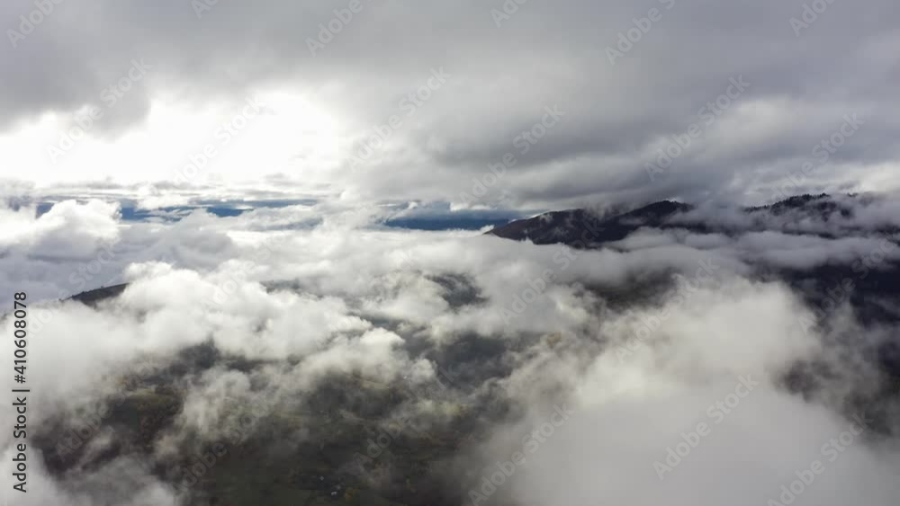 Autumn flight through blue sky in Carpatian autumn mountains, Aerial UHD 4K drone realtime video, shot in 10bit HLG and colorized Autumn flight through blue sky in Carpatian autumn mountains, Aerial UHD 4K drone realtime video, shot in 10bit HLG and colorized
