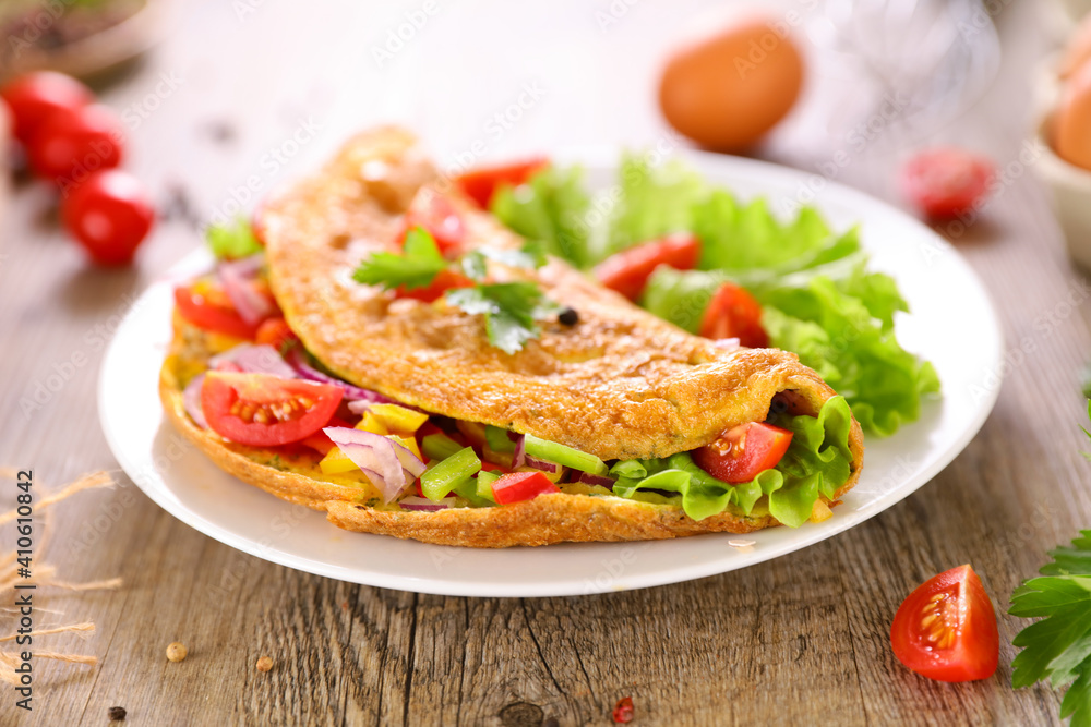 omelet with vegetables and lettuce