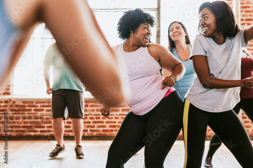 Playful active people in a fitness studio photo