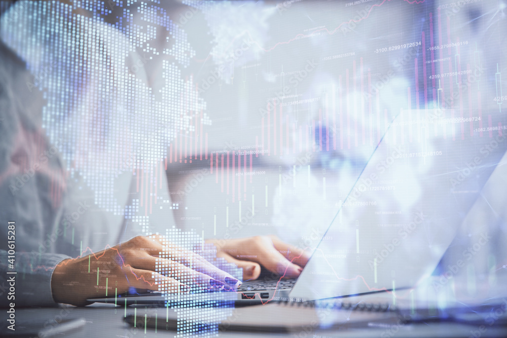 Double exposure of woman hands working on computer and forex graph hologram drawing. Financial analysis concept. Double exposure of woman hands working on computer and forex graph hologram drawing. Financial analysis concept.