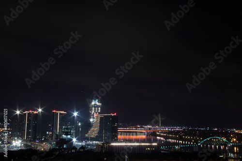 Panoramic night view on Belgrade, (Beograd in Serbian), on river Danube and Sava and bridges over them, view at old but also new part of town © Miros