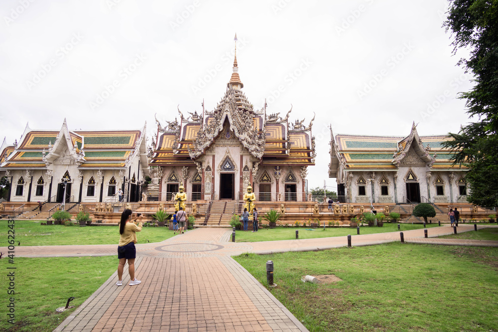 Naklejka premium Nakhon Pathom, Thailand-November 1, 2020 : Asian tourists at Wat Si Sa Thong, Amazing old Historical Sites in Thailand.