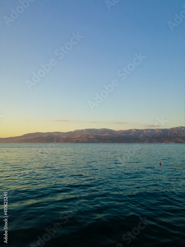 Fantastic evening view from the coast of Brač island.

Supetar, Croatia - July 27th 2020