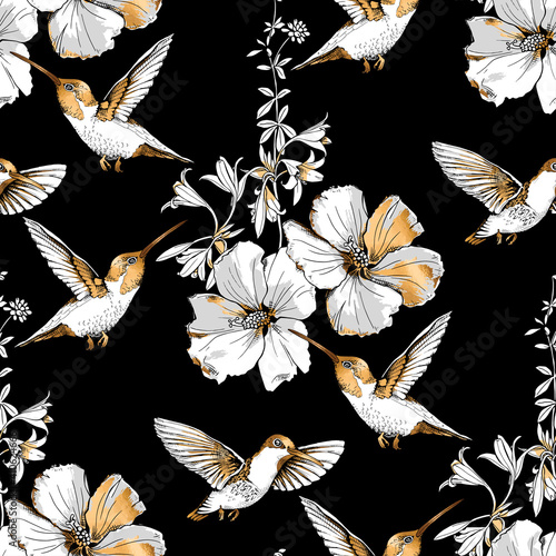 Seamless pattern. Exotic Tropical Hibiscus flowers and hummingbirds. Gold and silver composition on a black background. Textile composition, hand drawn style print. Vector illustration.