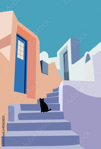 Cute black cat on stair way, view of beautiful traditional santorini housing and building architecture.