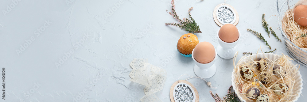 Easter composition with eggs and colorful sweets on light gray background. - obrazy, fototapety, plakaty 