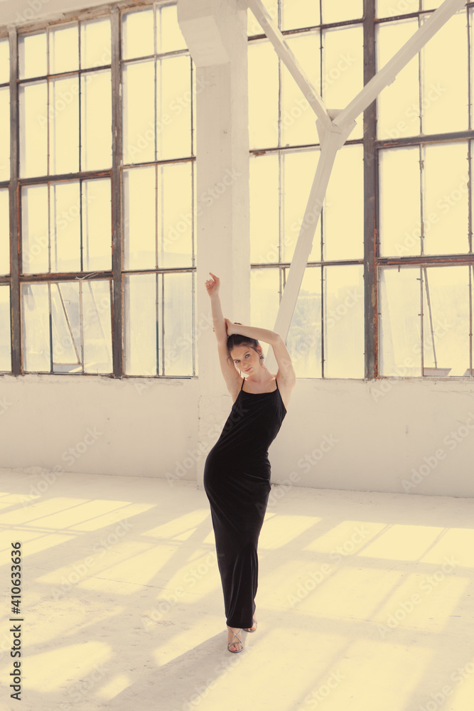 Fototapeta premium Fashion beauty portraits of a girl in a black dress and with vitiligo