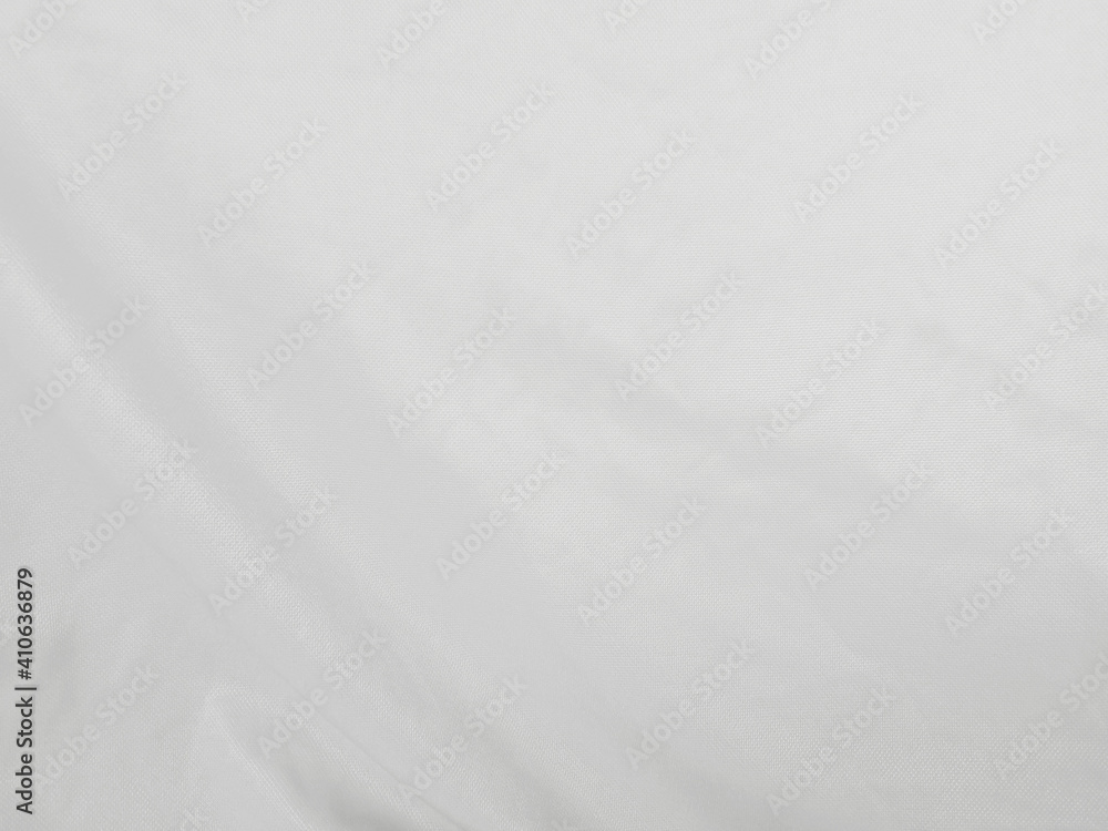 Soft white wrinkled fabric background Soft white wrinkled fabric background