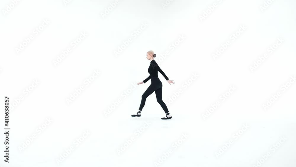 Young blonde woman ballerina running and jumping up - white bright studio Young blonde woman ballerina running and jumping up - white bright studio