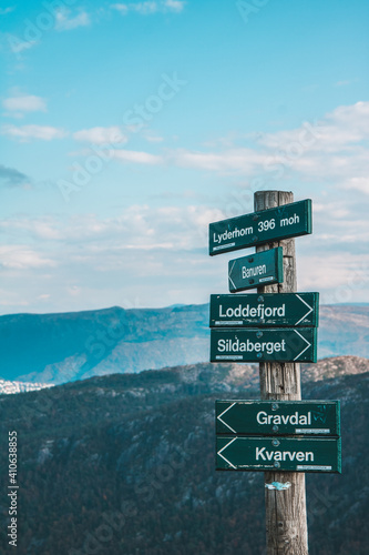 Directional sign at the top of Lyderhorn Mountain, Bergen, Norway