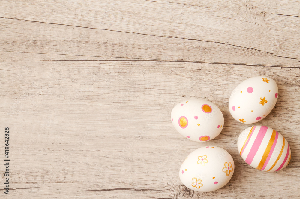 Colorful perfect handmade painted easter eggs on a wood background. - obrazy, fototapety, plakaty 