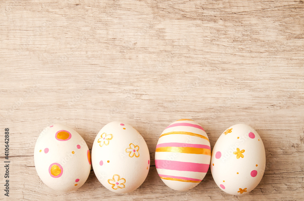 Colorful perfect handmade painted easter eggs on a wood background. - obrazy, fototapety, plakaty 