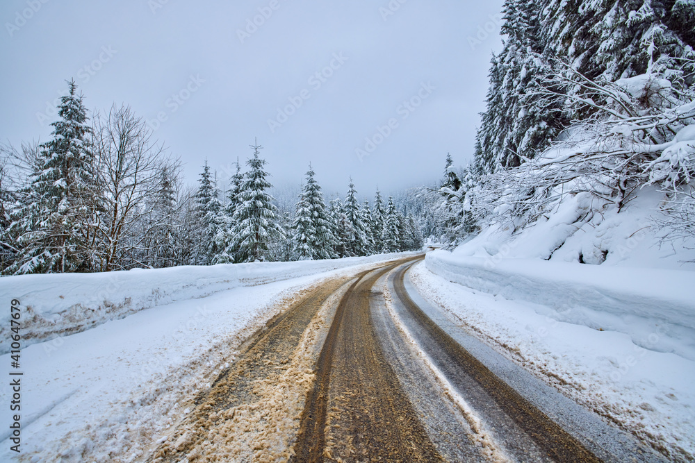 landscape with an empty mountain road in winter landscape with an empty mountain road in winter