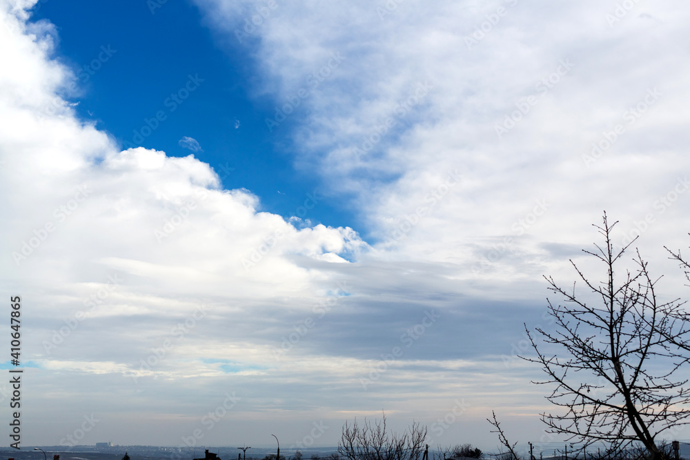 Naklejka premium Blue sky with clouds. Texture background