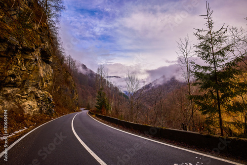 landscape with an empty mountain road in winter
