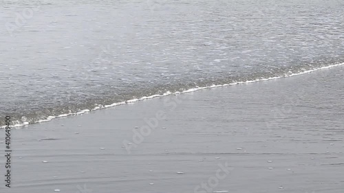 Soft wave on the sand beach. Summer sunset seascape. cox Bazar Beach. photo