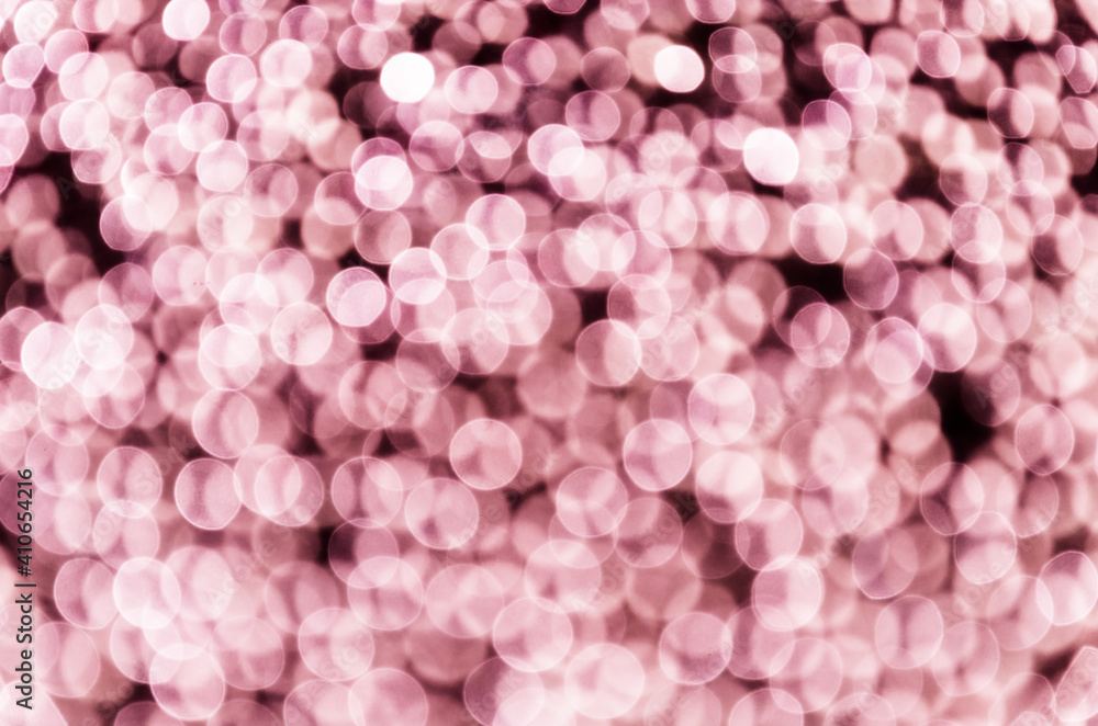 Pink bokeh, abstract background with defocused bright light