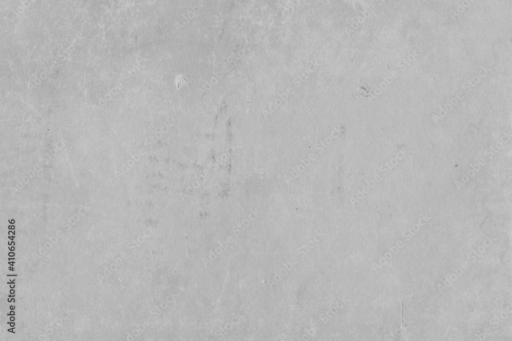 Cardboard gray texture close-up. Light old paper background. Grunge concrete wall. Vintage blank wallpaper. Cardboard gray texture close-up. Light old paper background. Grunge concrete wall. Vintage blank wallpaper.