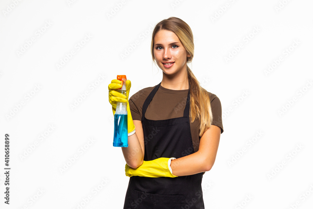 Portrait of woman holding a sprayer isolated on white background. Ready for cleaning Portrait of woman holding a sprayer isolated on white background. Ready for cleaning