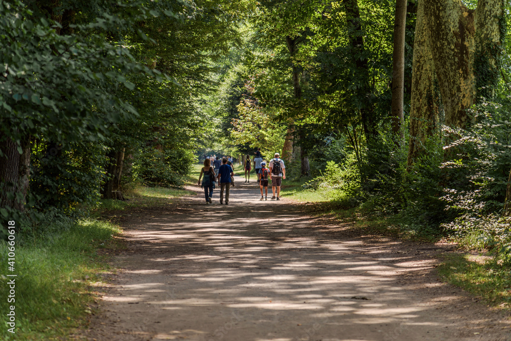 People walking in Castle Park of Vizille People walking in Castle Park of Vizille