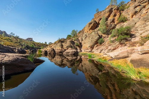 Lake Bear Gulch and rock formations in Pinnacles National Park in California, the ruined remains of an extinct volcano on the San Andreas Fault. Beautiful landscapes, cozy hiking trails for tourists