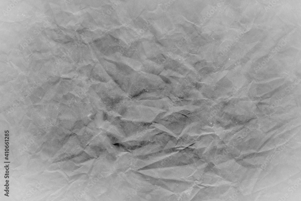 Naklejka premium Cardboard gray texture close-up. Light old paper background. Grunge concrete wall. Vintage blank wallpaper.