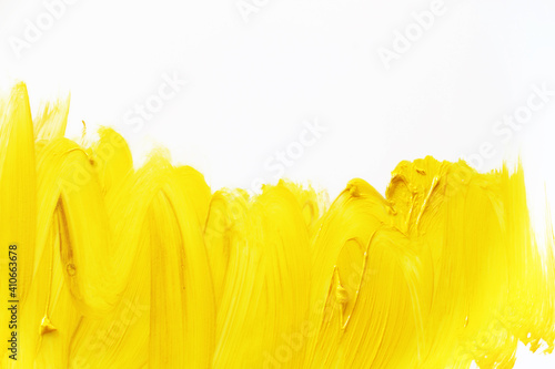 yellow paint brush strokes on white background