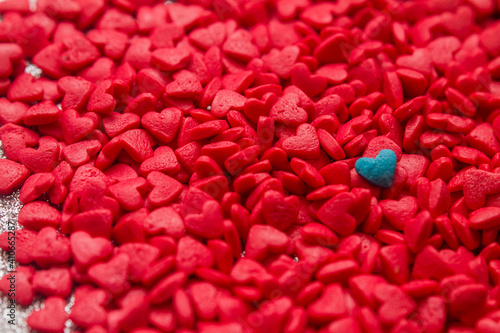 close up of red chocolate sprinkles hearts