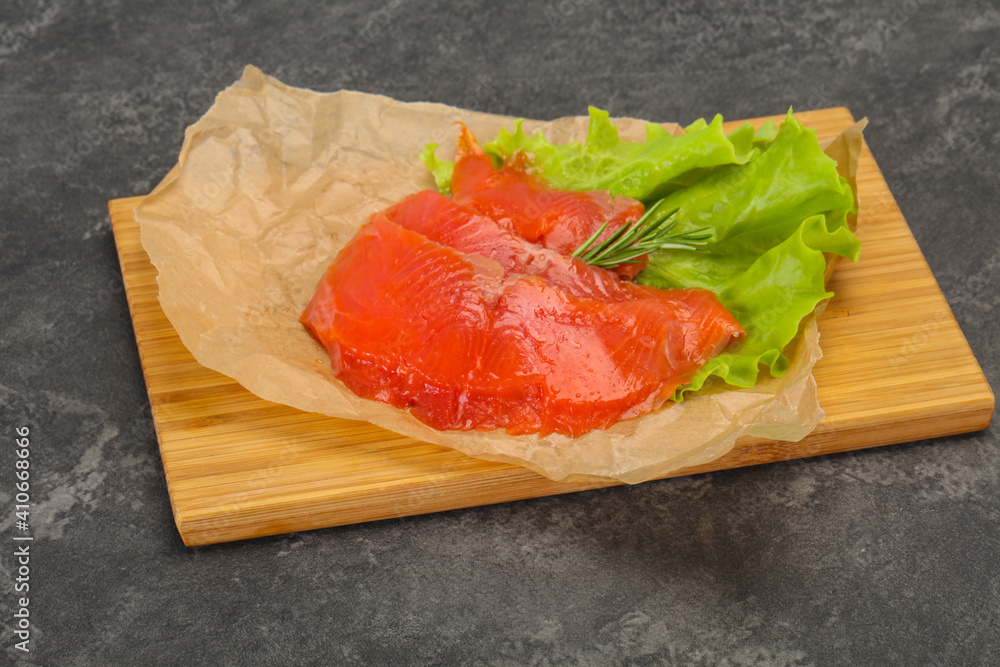 Sliced salmon fillet served rosemary Sliced salmon fillet served rosemary