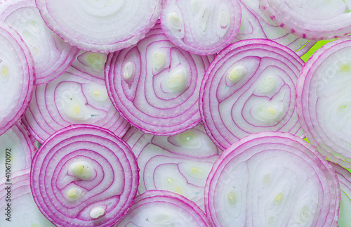 Top view of back-lighted onion slices