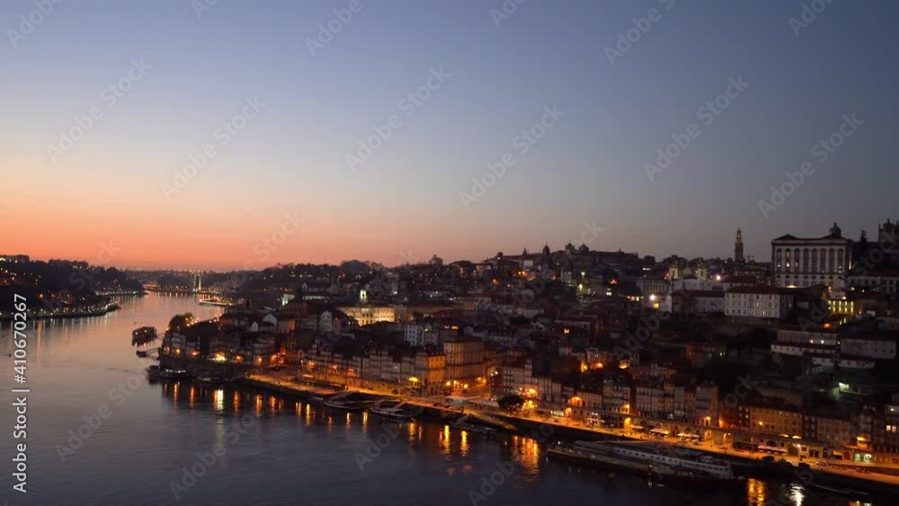 The Ribeira district in in Porto enlighten at night blue hour, Portugal The Ribeira district in in Porto enlighten at night blue hour, Portugal