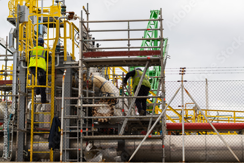 mechanics working in an industrial plant
