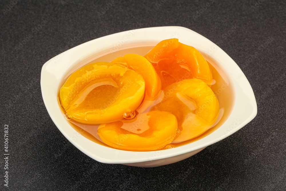 Marinated peaches fruit in the bowl Marinated peaches fruit in the bowl