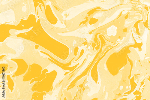 Yellow luxury marble ink texture on watercolor paper background. Marble stone image. Bath bomb effect. Psychedelic biomorphic art.