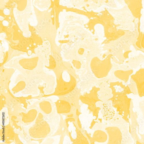 Yellow luxury marble ink texture on watercolor paper background. Marble stone image. Bath bomb effect. Psychedelic biomorphic art.